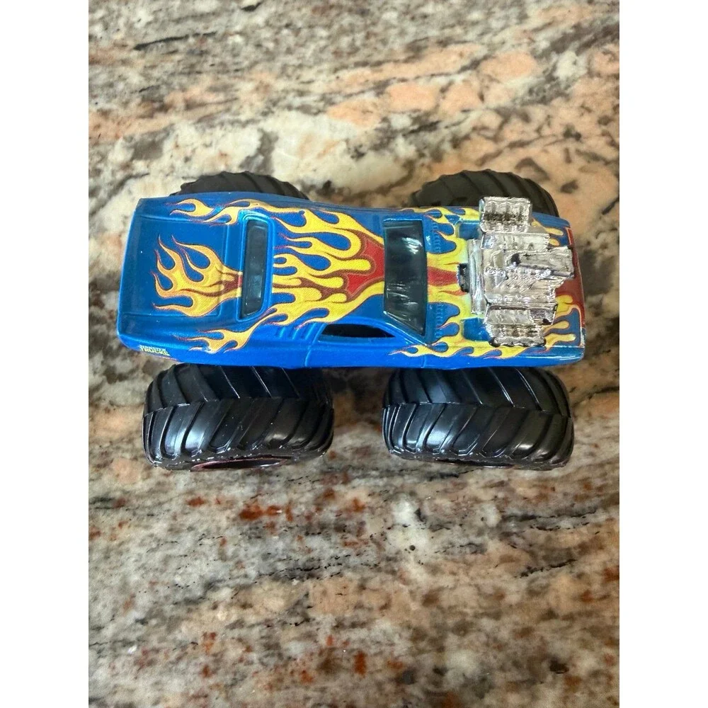 Hot Wheels Monster Jam Trucks Rodger Dodge - Blue w/ Red Rims  1:64 Scale